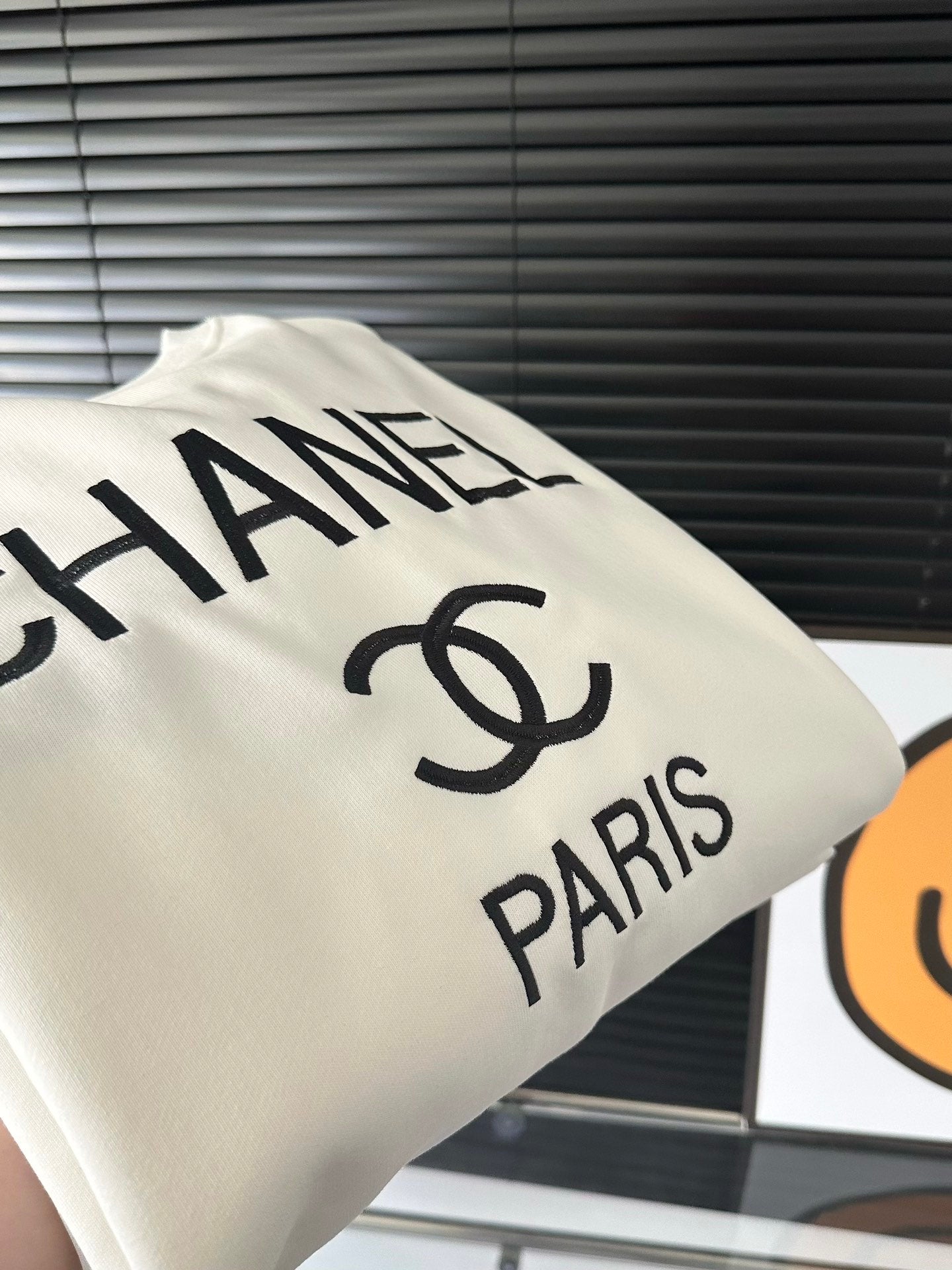 Black and white crew neck sweatshirt with front and back embroidery logo XC0823100906