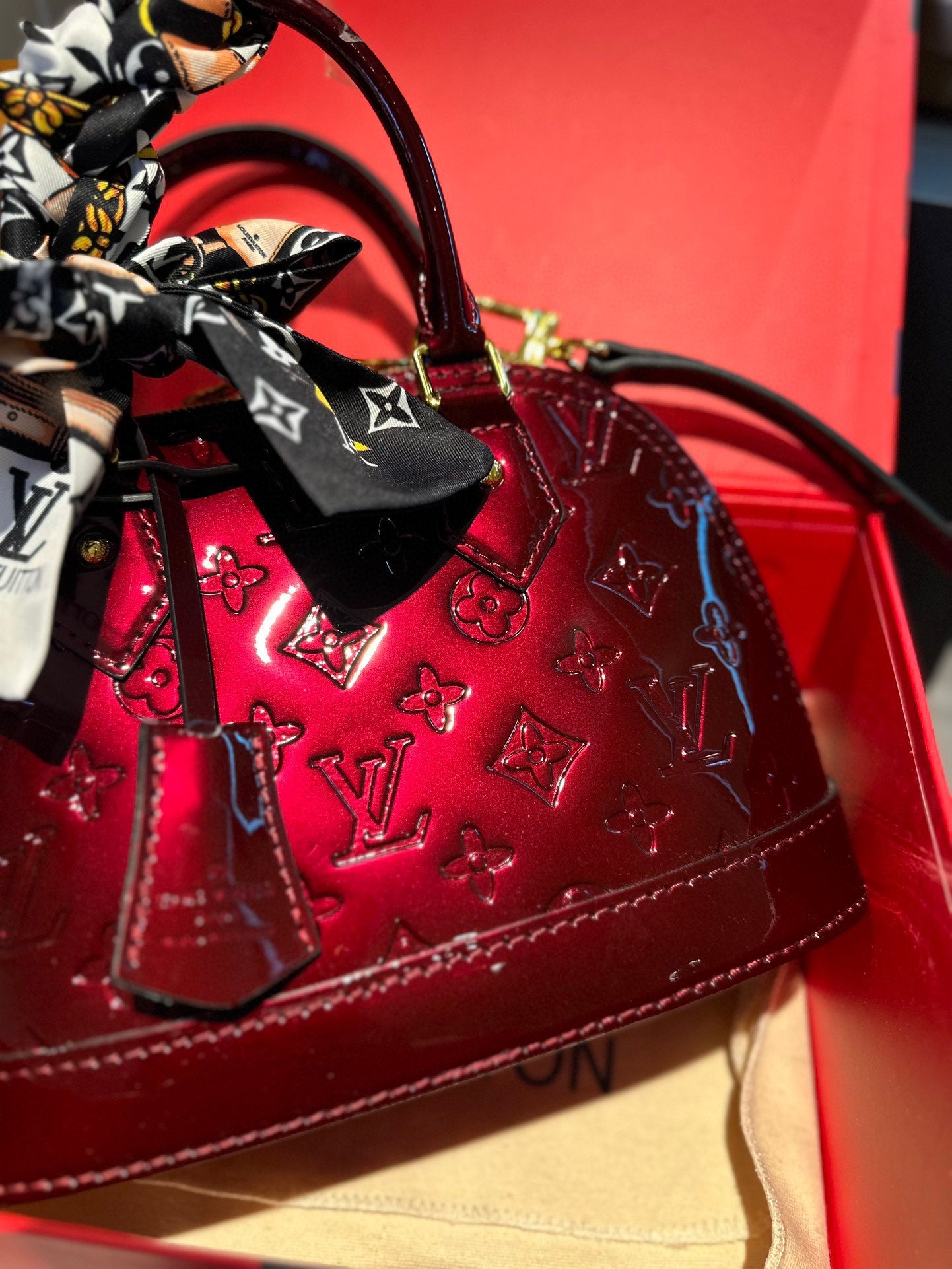 Embossed bright leather Alma shell bag 1824041702