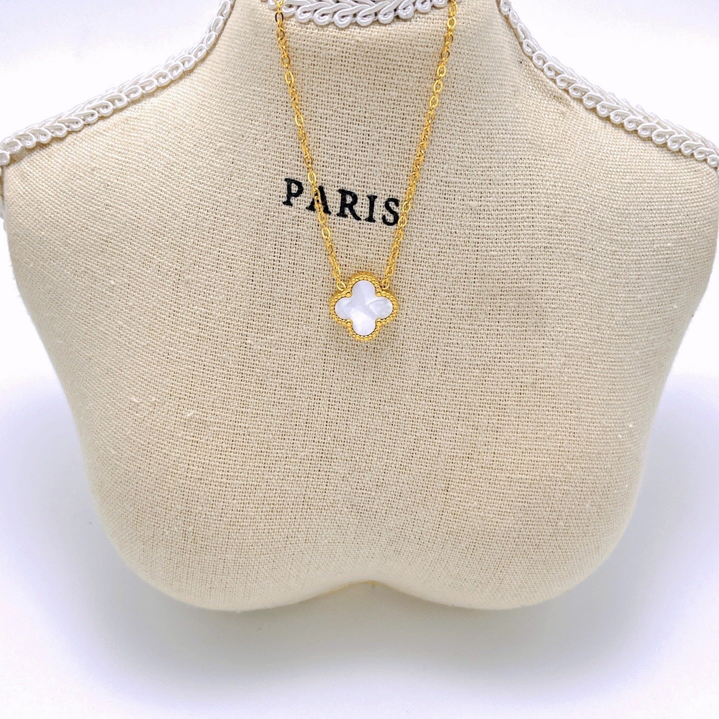 Black and white double-sided four-leaf flower necklace 2025081302