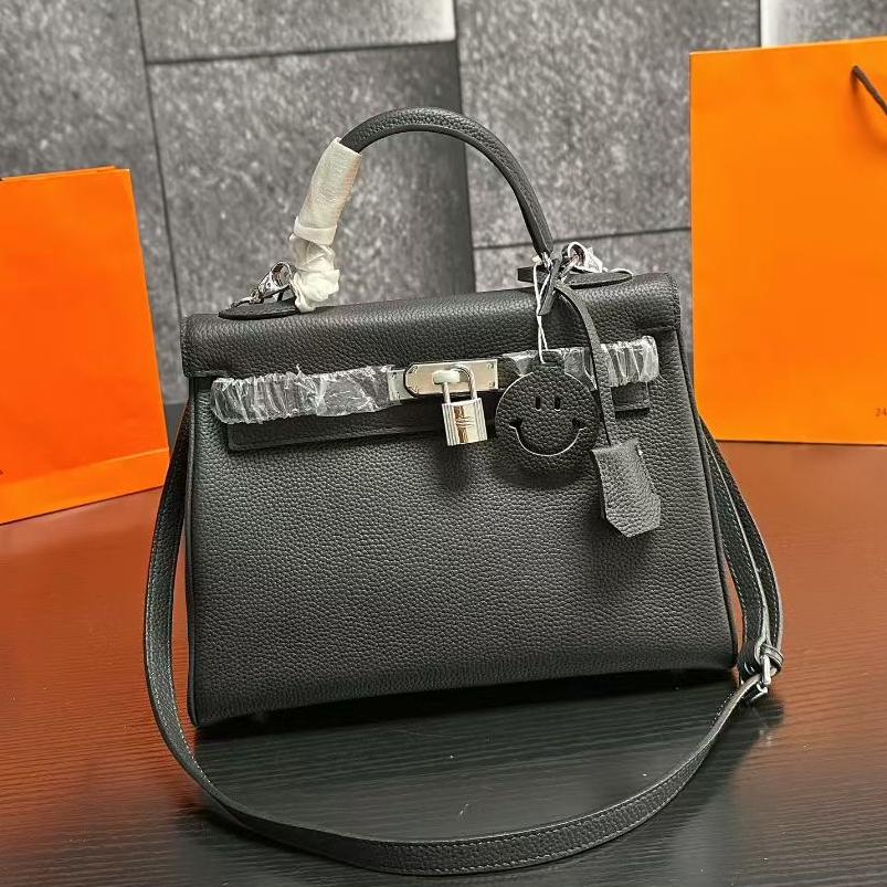 Hms fashionable cowhide handbag 0725091703