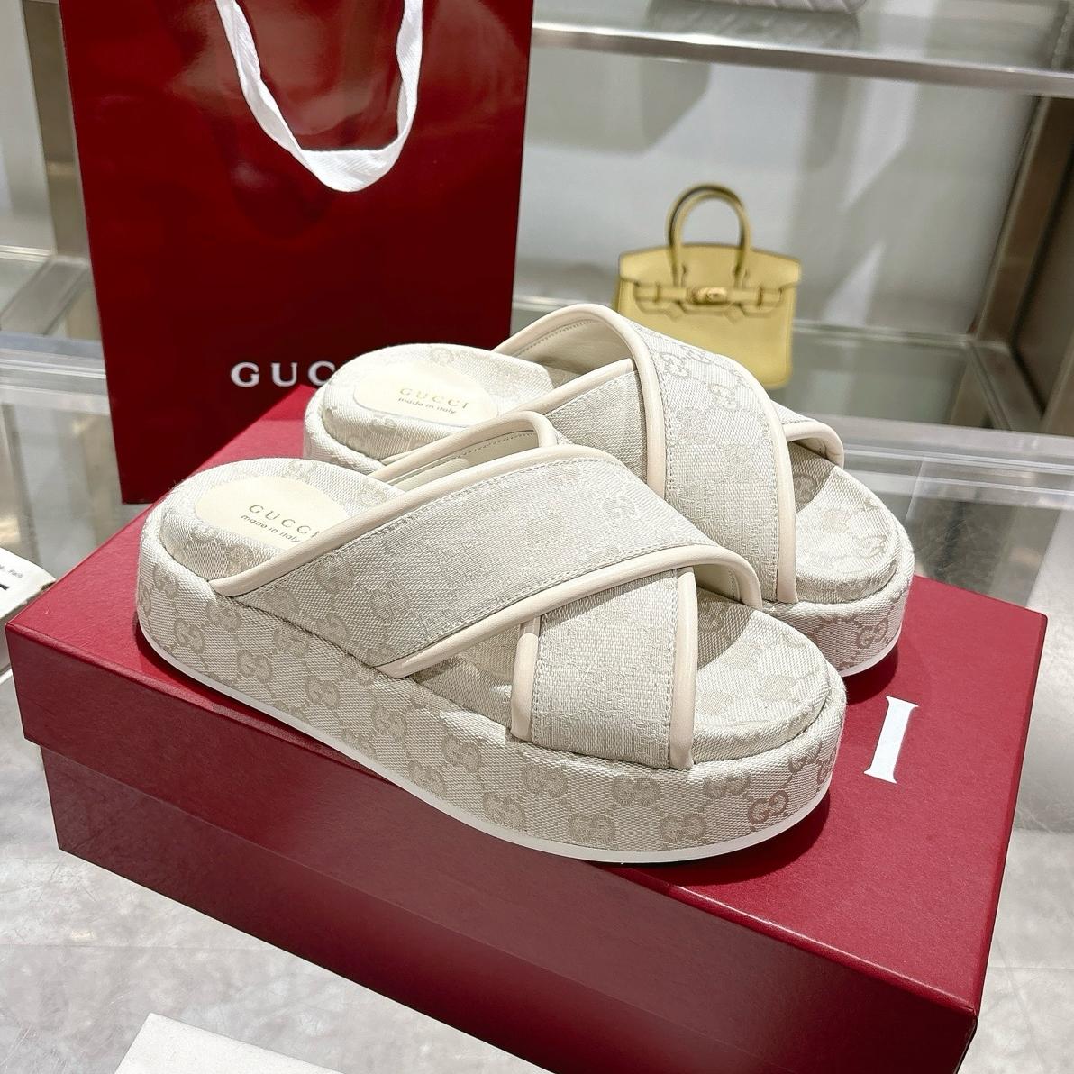 GG cross-upper thick-soled flip-flops 0725052901