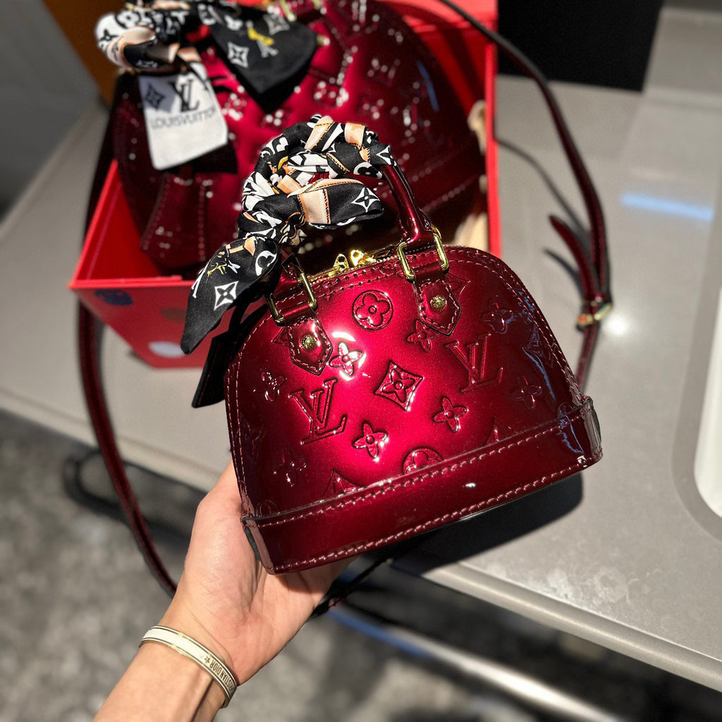 Embossed bright leather Alma shell bag 1824041702