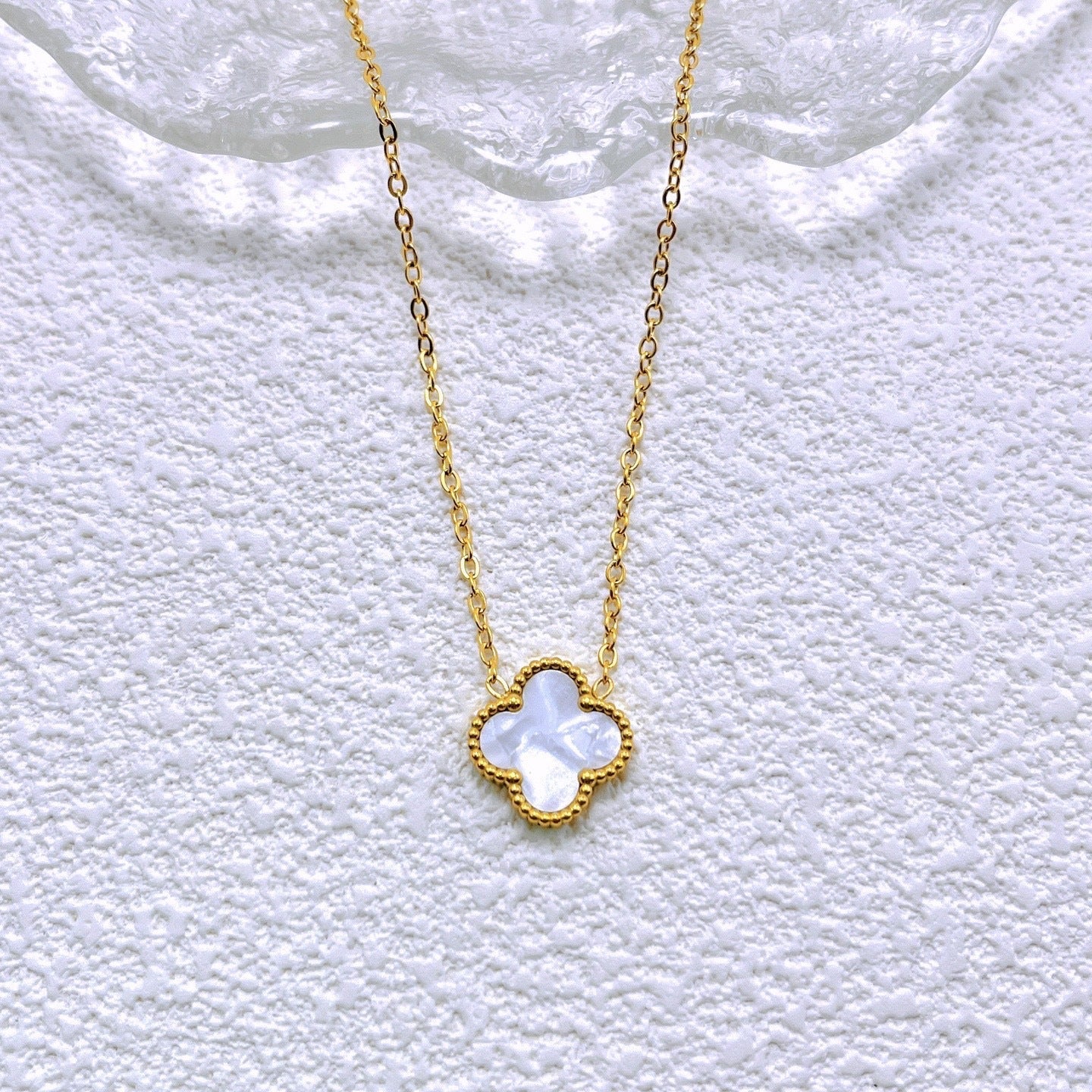 Black and white double-sided four-leaf flower necklace 2025081302