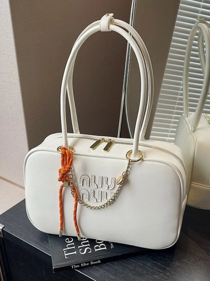 A niche and light luxury single-shoulder Boston bag 2025073003