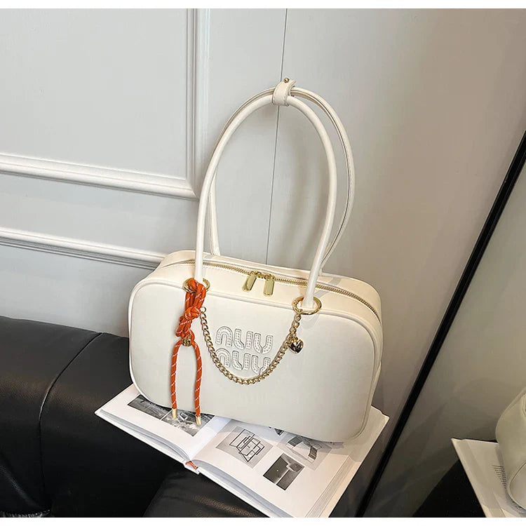 A niche and light luxury single-shoulder Boston bag 2025073003